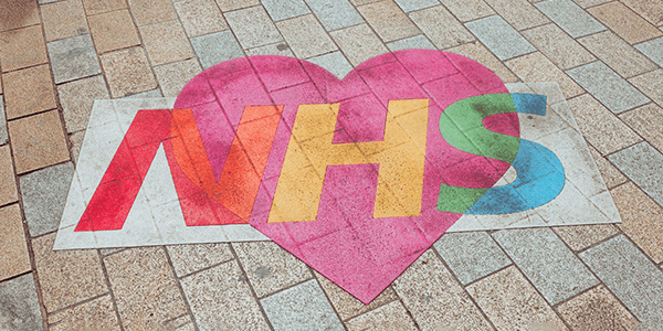 An image of the NHS logo, where you can get semaglutide.