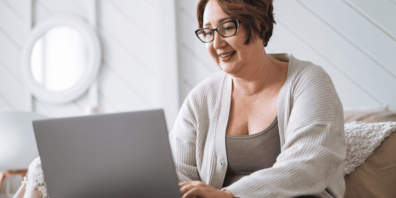 Middle aged woman on her laptop