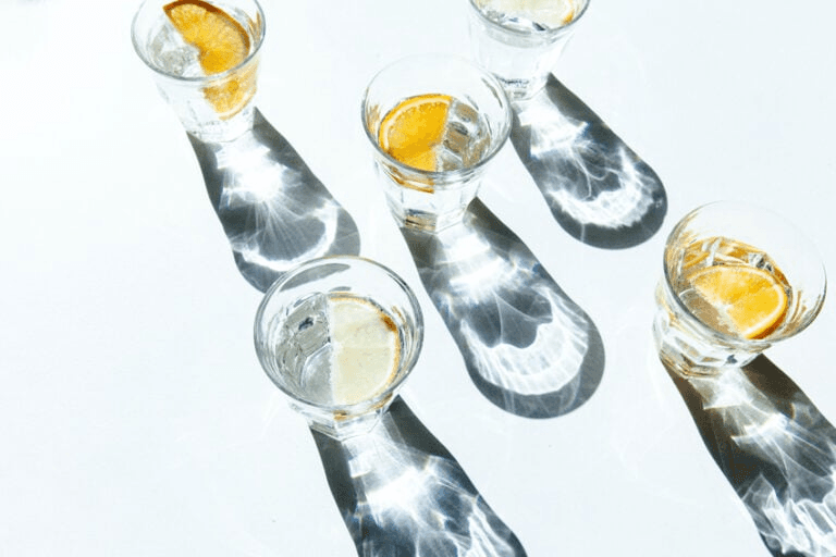 Shot glasses containing alcohol, which represent the question, can you drink alcohol on Mysimba?