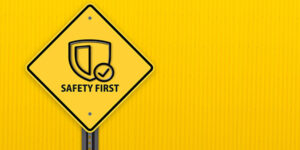 Yello Safety first road sign