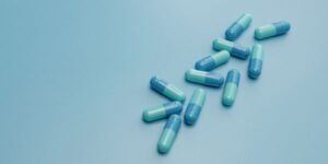 blue medication capsules